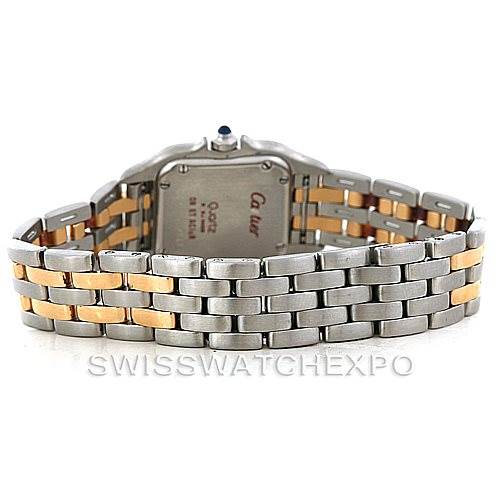 This image shows the back side and bracelet of a Panthere model watch by Cartier, highlighting the two-tone metal design.