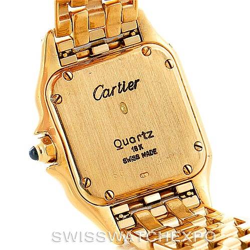 The image shows the back case and part of the bracelet of a gold Cartier Panthere W25022B9 Women's Yellow Gold Silver Dial W25022B9 Women's Yellow Gold Silver Dial model watch, including its clasp and markings.