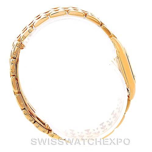 The image shows the side view of a Panthere model by Cartier, highlighting its gold-colored bracelet and case profile.