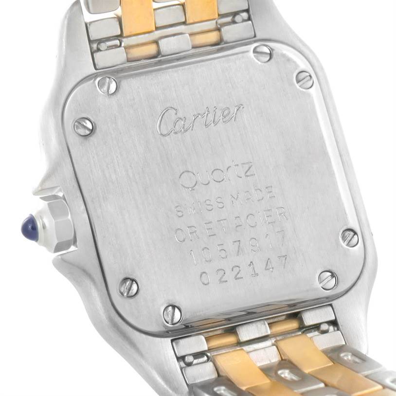 The image shows the case back of a Cartier Panthere W25029B6 Women
s Stainless Steel Silver Dial W25029B6 Women
s Stainless Steel Silver Dial watch, including the bracelet
s connection and inscriptions.