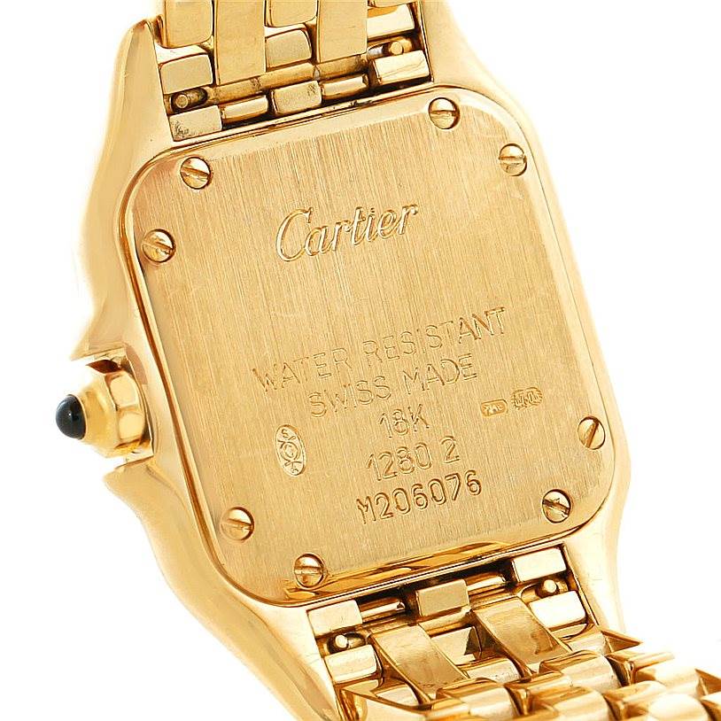The image shows the back of a Cartier Panthere W25022B9 Women's Yellow Gold Blue Dial W25022B9 Women's Yellow Gold Blue Dial watch, focusing on the case back and bracelet links.