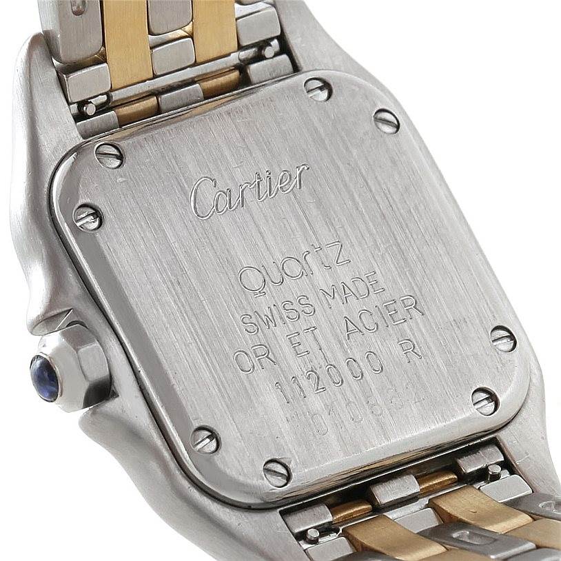 The image shows the backside of a Cartier Panthère watch, revealing the case back and part of the two-tone bracelet.
