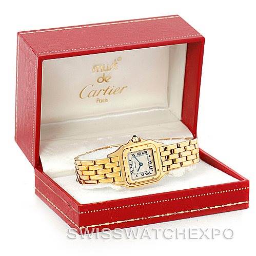 The image shows a Cartier Panthere W25022B9 Women's Yellow Gold Silver Dial W25022B9 Women's Yellow Gold Silver Dial watch placed inside an open Cartier red jewelry box, displaying the watch face and gold bracelet.