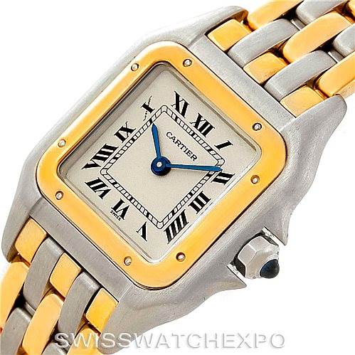 This image displays a close-up of the face and part of the bracelet of a Cartier Panthere W25029B6 Women
s Stainless Steel Silver Dial W25029B6 Women
s Stainless Steel Silver Dial watch, highlighting its gold and silver tones.