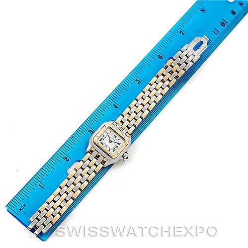 This image shows a Cartier Panthere W25029B6 Women
s Stainless Steel Silver Dial W25029B6 Women
s Stainless Steel Silver Dial model watch laid flat next to a blue ruler for scale.