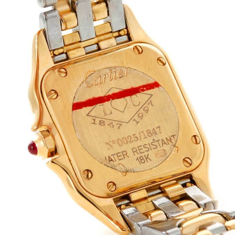 This image shows the back case of the Cartier Panthere W25046S1 Women's Yellow Gold Silver Dial W25046S1 Women's Yellow Gold Silver Dial watch, highlighting the engraved details and part of the bracelet.