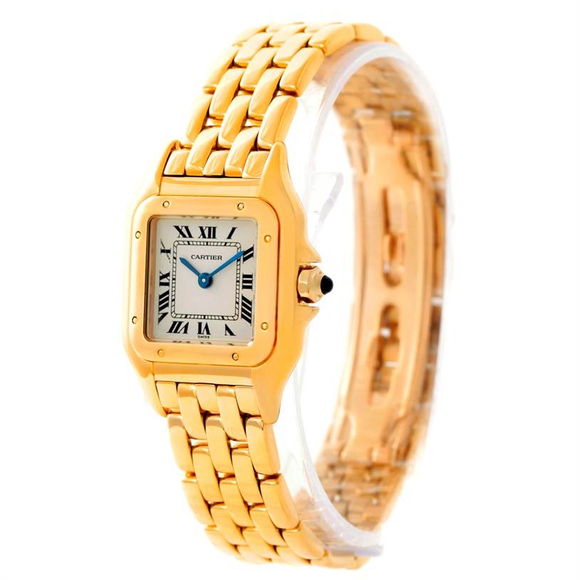 The Cartier Panthere W25022B9 Women
s Yellow Gold Silver Dial W25022B9 Women
s Yellow Gold Silver Dial watch is shown at an angle that highlights its gold bracelet, square face, and side crown.