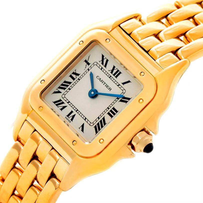 The image shows a close-up of the Cartier Panthere W25022B9 Women
s Yellow Gold Silver Dial W25022B9 Women
s Yellow Gold Silver Dial watch face and part of the gold bracelet from an angled view.