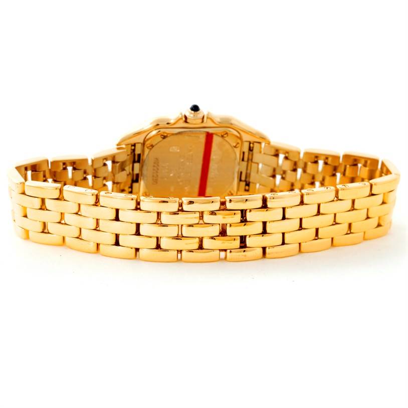 The image shows the back view of a gold Cartier Panthere W25022B9 Women
s Yellow Gold Silver Dial W25022B9 Women
s Yellow Gold Silver Dial watch, highlighting its intricately designed bracelet and case back.