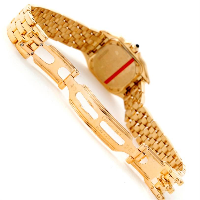 The image shows the band and deployment clasp of a Cartier Panthere W25022B9 Women
s Yellow Gold Silver Dial W25022B9 Women
s Yellow Gold Silver Dial watch, highlighting the intricate bracelet design.