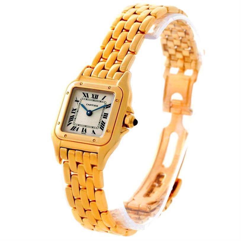 This Cartier Panthere W25022B9 Women's Yellow Gold Silver Dial W25022B9 Women's Yellow Gold Silver Dial watch is shown at an angle, displaying its square face, Roman numerals, and gold link bracelet.