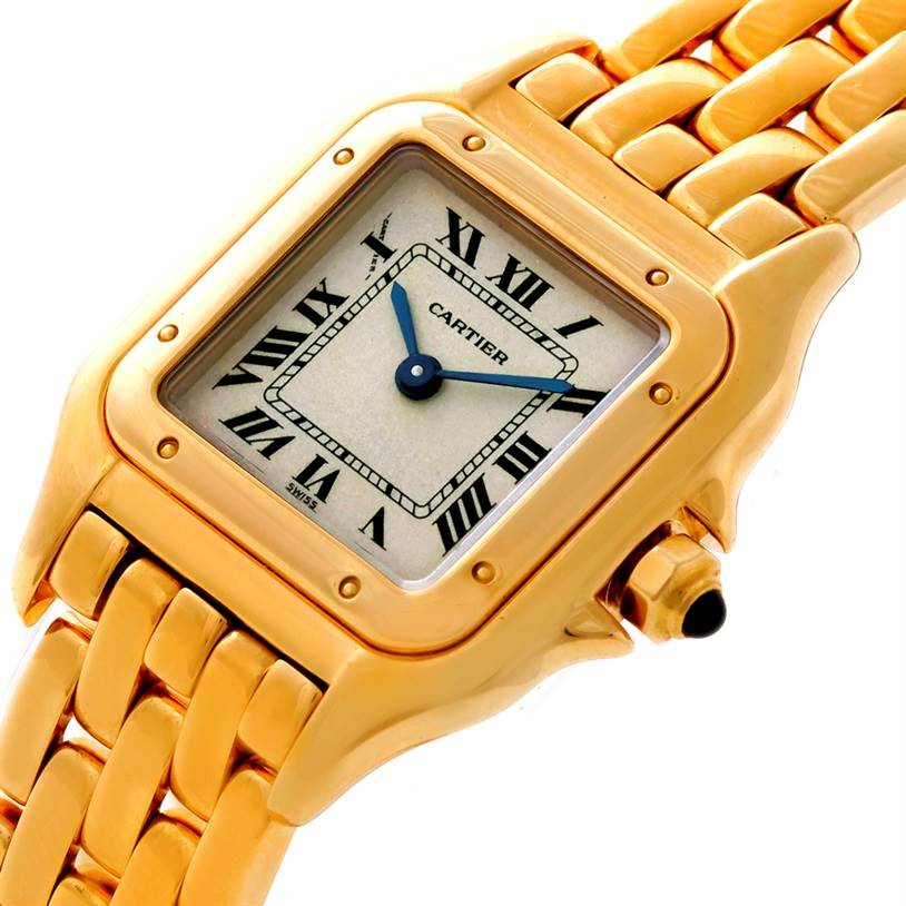 The image shows a close-up angle of the Panthere model by Cartier, highlighting the face, bezel, and part of the bracelet.
