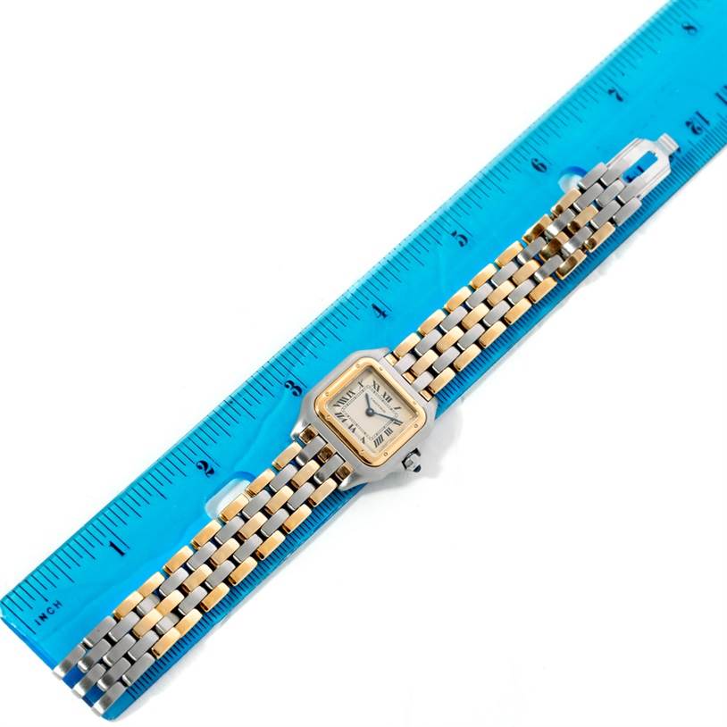 The Cartier Panthere W25029B6 Women's Stainless Steel Beige Dial W25029B6 Women's Stainless Steel Beige Dial watch is shown from a top-down angle, aligned next to a blue ruler for scale.