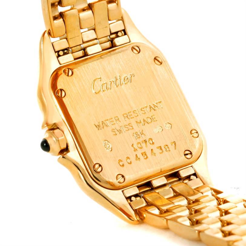 The image shows the back case and bracelet of a Cartier Panthere W25022B9 Women
s Yellow Gold Silver Dial W25022B9 Women
s Yellow Gold Silver Dial watch at an angle.