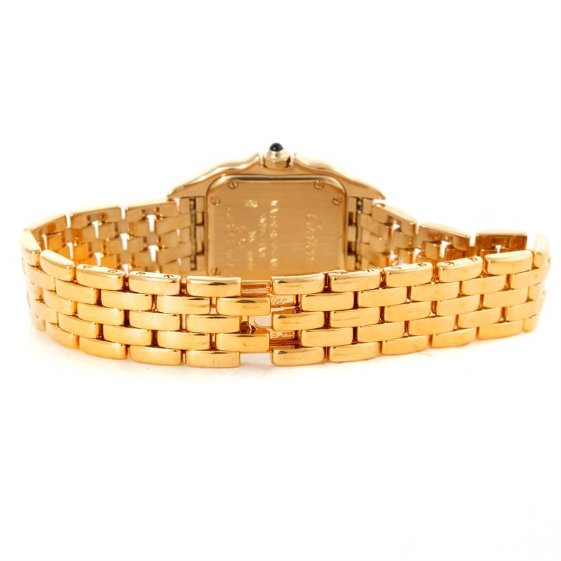 The image shows the back view of a Cartier Panthere W25022B9 Women
s Yellow Gold Silver Dial W25022B9 Women
s Yellow Gold Silver Dial watch, highlighting its gold bracelet and case back.
