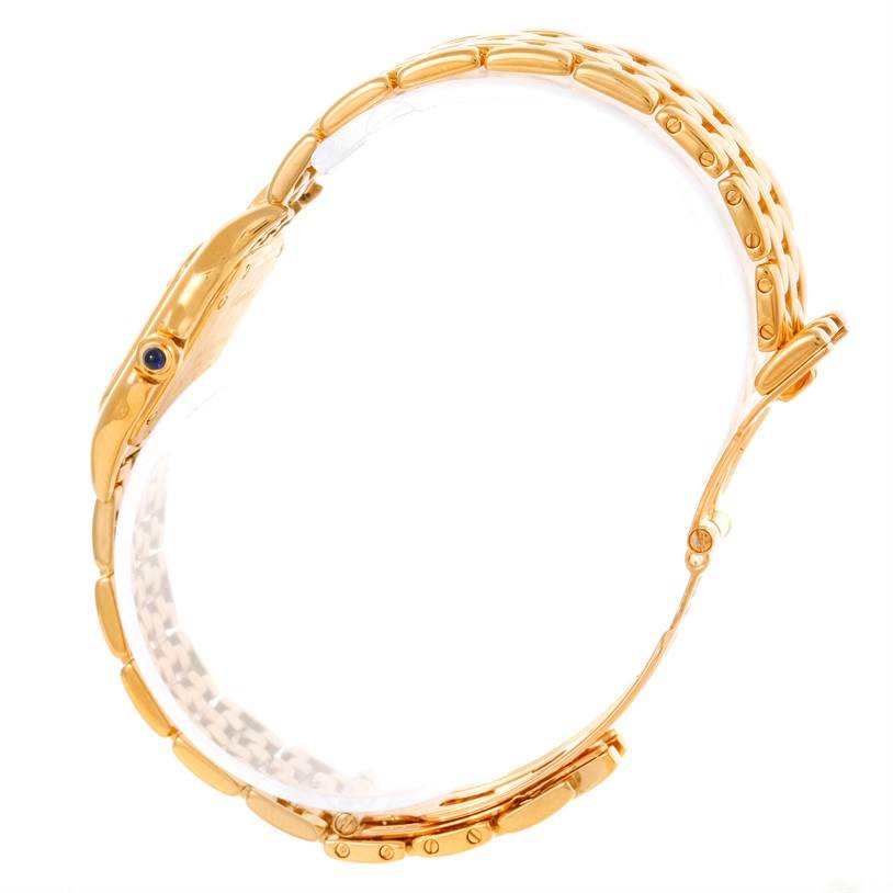 The image shows a side view of a Cartier Panthere W25022B9 Women
s Yellow Gold Silver Dial W25022B9 Women
s Yellow Gold Silver Dial watch, focusing on its gold bracelet and case with crown detail.