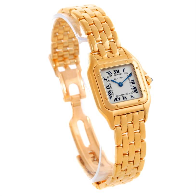 The image shows a Cartier Panthere W25022B9 Women
s Yellow Gold Silver Dial W25022B9 Women
s Yellow Gold Silver Dial model watch from an angled side view, highlighting its gold bracelet and square face with Roman numerals.