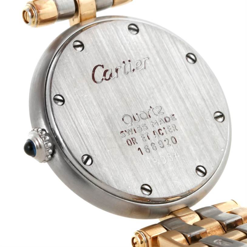 The image shows the back case and part of the band of the Panthère de Cartier watch, highlighting the brand inscription.