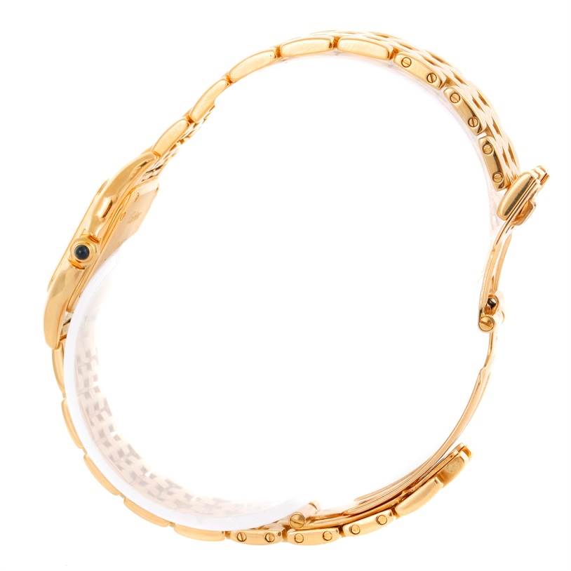 The Cartier Panthere W25022B9 Women's Yellow Gold Silver Dial W25022B9 Women's Yellow Gold Silver Dial model watch is shown from a side angle, highlighting its gold bracelet and crown.