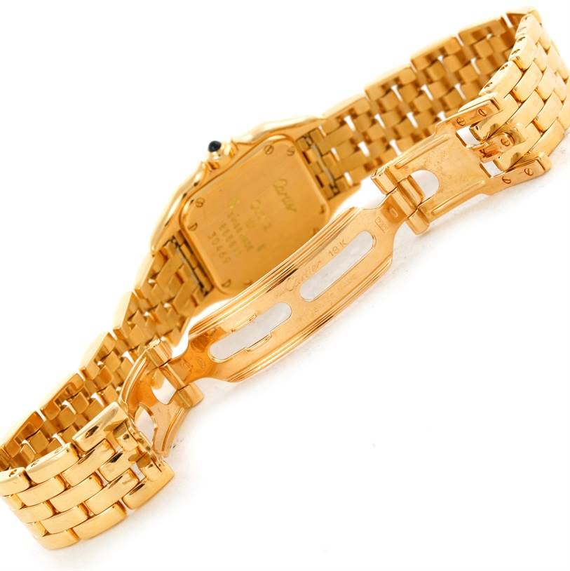 The image shows the clasp and underside of the Panthere model watch by Cartier in a gold finish.