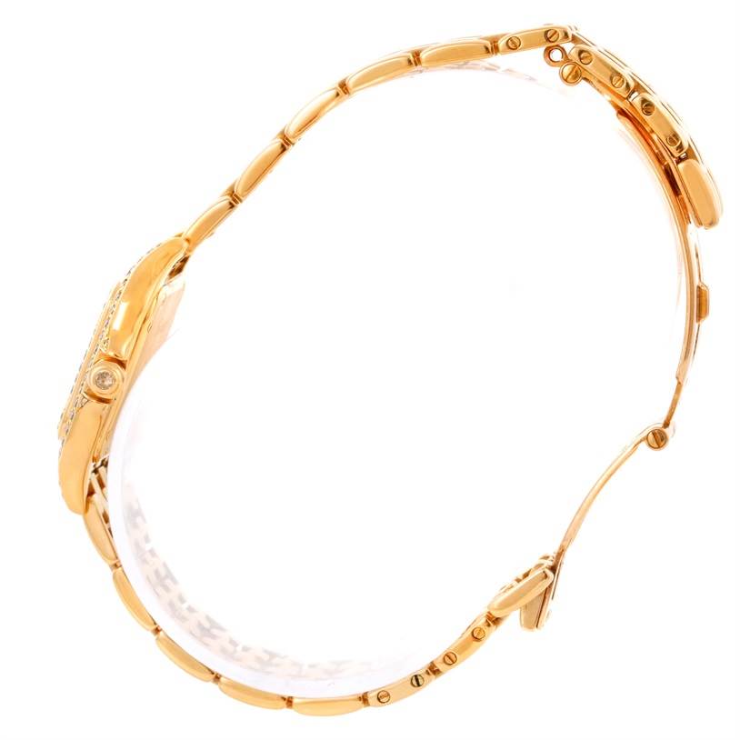 This Cartier Panthere Women's Yellow Gold Champagne Dial Women's Yellow Gold Champagne Dial watch is shown from a side profile, displaying the case, bezel, crown, and bracelet.