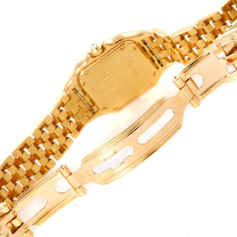 The image shows the back and clasp of a gold Cartier Panthere Women's Yellow Gold Champagne Dial Women's Yellow Gold Champagne Dial watch at an angled view.