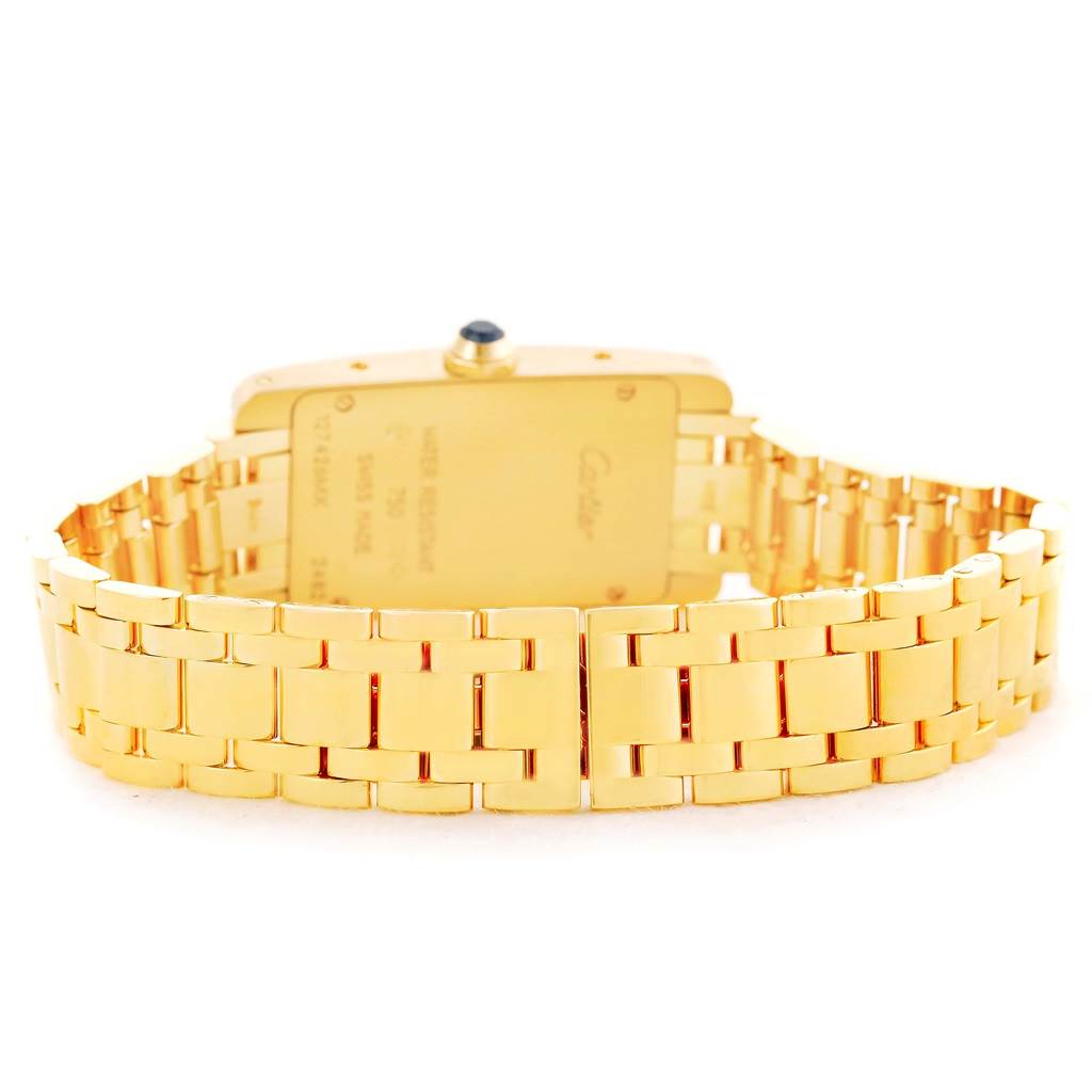 This image shows the back and bracelet of a Cartier Tank Americaine W26015K2 Women's Yellow Gold Silver Dial W26015K2 Women's Yellow Gold Silver Dial watch from a rear angle.