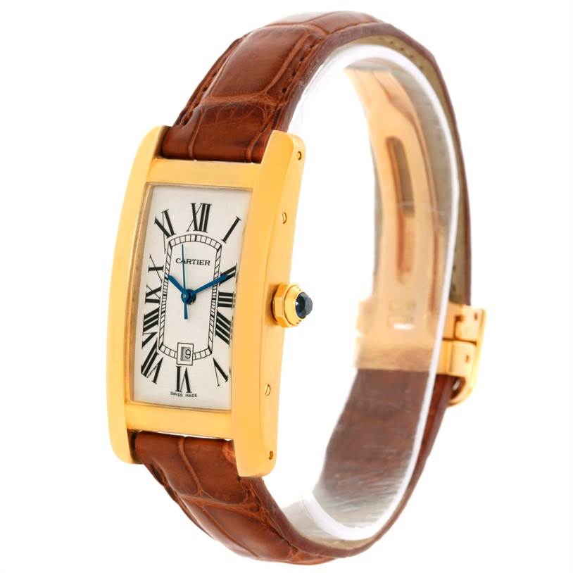 This image shows a Cartier Tank Américaine watch at a slight angle, highlighting its gold case, brown leather strap, and rectangular dial.