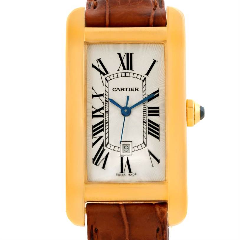 The image shows a front view of the Cartier Tank Americaine W2603556 Women's Yellow Gold Silver Dial W2603556 Women's Yellow Gold Silver Dial watch, highlighting its rectangular face and leather strap.