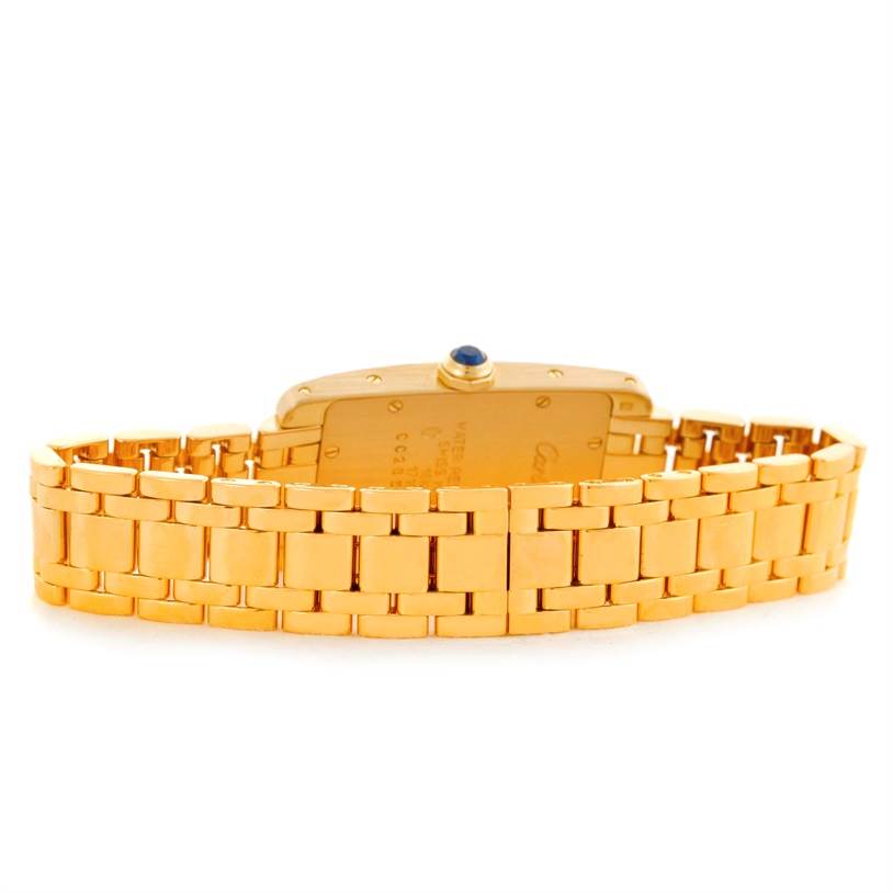 This image shows the back and gold bracelet of a Tank Américaine model by Cartier.