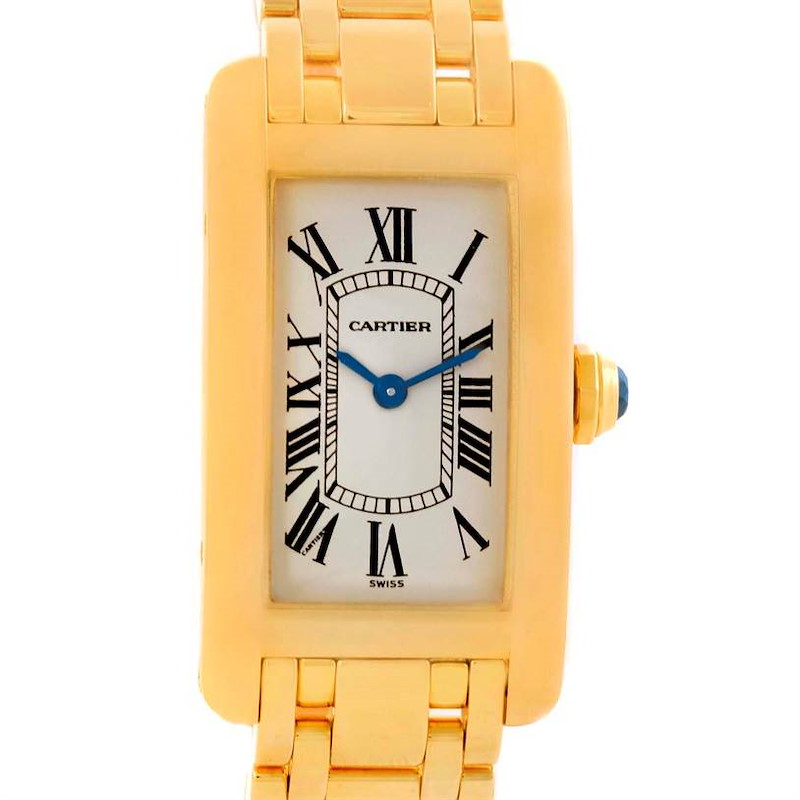 The Cartier Tank Americaine watch is shown from a front angle, displaying its face, case, and part of the bracelet.