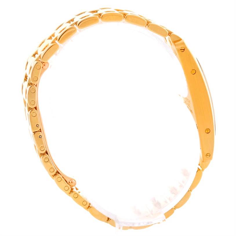 The image shows the side angle of the Cartier Tank Americaine W26015K2 Women's Yellow Gold Silver Dial W26015K2 Women's Yellow Gold Silver Dial watch, highlighting the bracelet and side case.