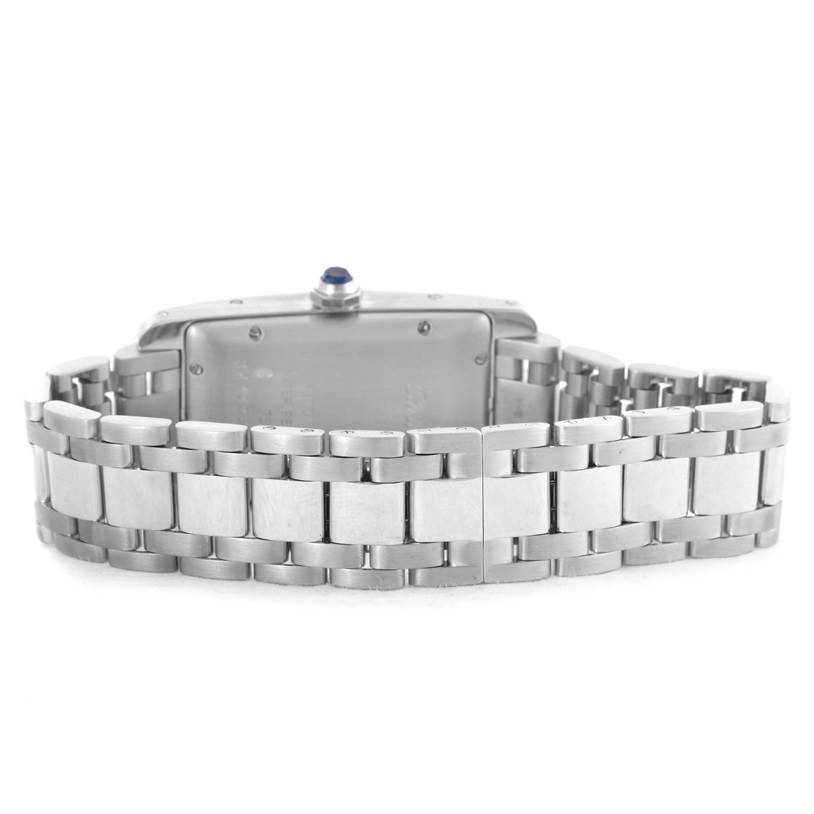 This image displays the back view of the Cartier Tank Americaine W26036L1 Women's White Gold Silver Dial W26036L1 Women's White Gold Silver Dial model watch, highlighting its metal bracelet and clasp.