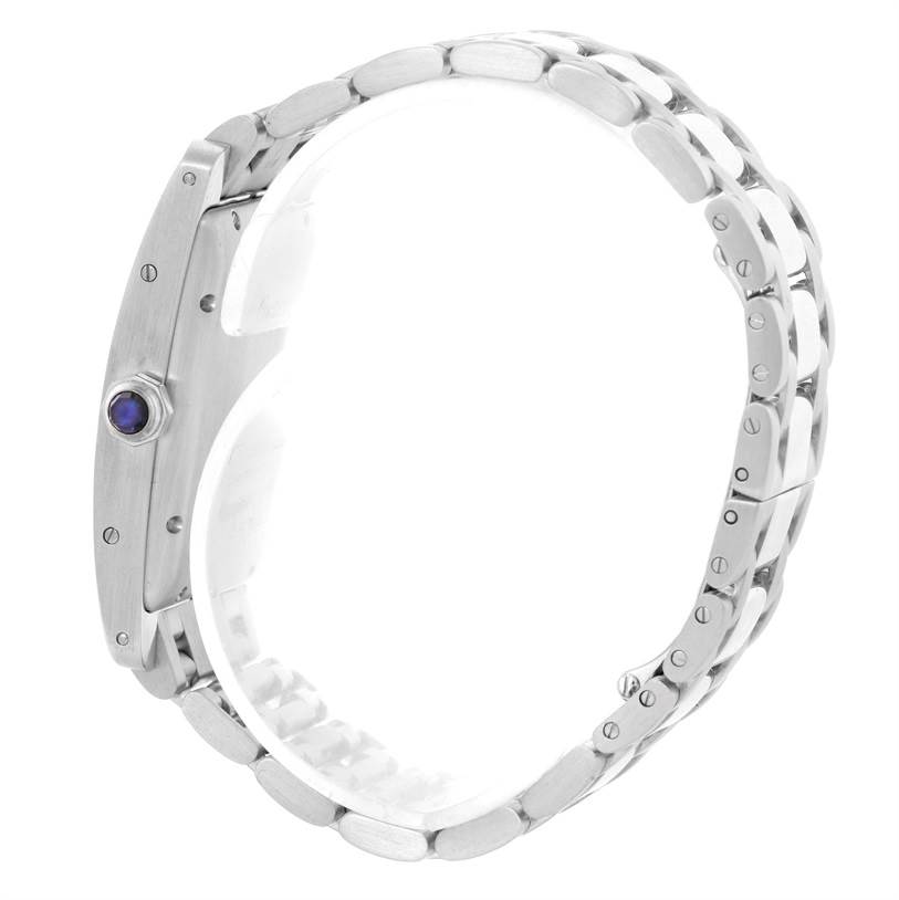 The image shows a side view of the Cartier Tank Americaine W26036L1 Women's White Gold Silver Dial W26036L1 Women's White Gold Silver Dial watch, highlighting its bracelet and side crown.