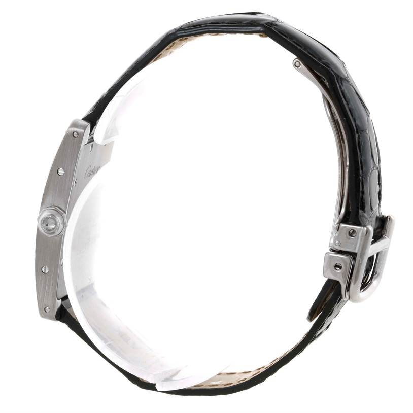 The image shows a side view of the Cartier Tank Americaine WB701851 Men's White Gold Silver Dial WB701851 Men's White Gold Silver Dial watch, highlighting the leather strap and stainless steel case.