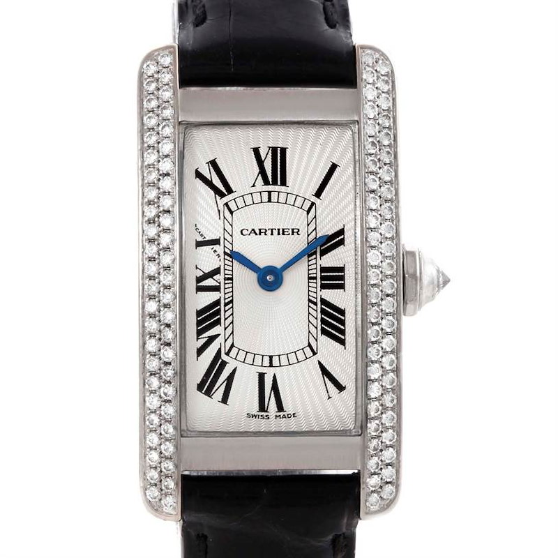 This image shows a front view of the Cartier Tank Americaine watch, highlighting its rectangular dial, Roman numerals, and bejeweled bezel.