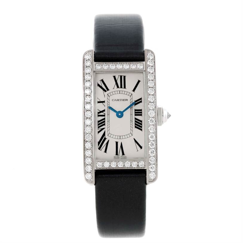The image shows a front view of the Cartier Tank Americaine WB707331 Women
s White Gold Silver Dial WB707331 Women
s White Gold Silver Dial watch, featuring its face, bezel, strap, and crown.
