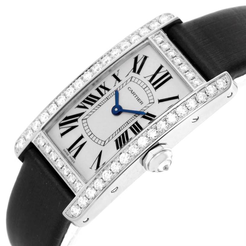 This image shows the face, bezel, and strap of a Cartier Tank Americaine WB707331 Women
s White Gold Silver Dial WB707331 Women
s White Gold Silver Dial watch, viewed at a slight angle.