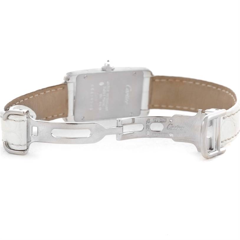 This image shows the back of a Cartier Tank Americaine WB701851 Women
s White Gold Silver Dial WB701851 Women
s White Gold Silver Dial watch, focusing on the clasp and strap details.