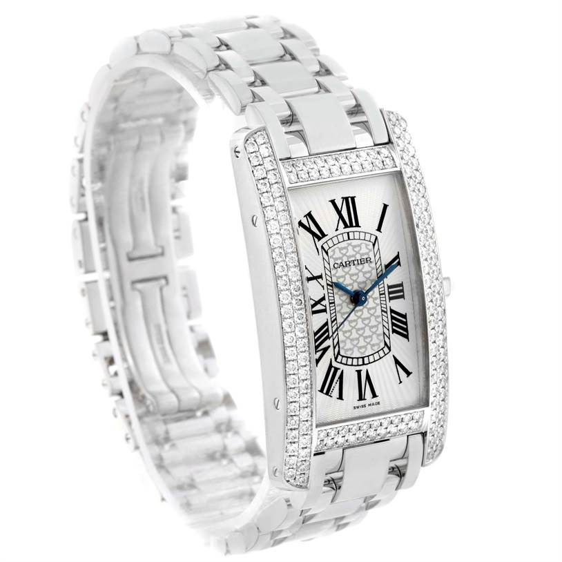 The Cartier Tank Americaine WB710001 Women
s White Gold Silver Dial WB710001 Women
s White Gold Silver Dial watch is shown from a front angle, highlighting its face, bezel, and bracelet.