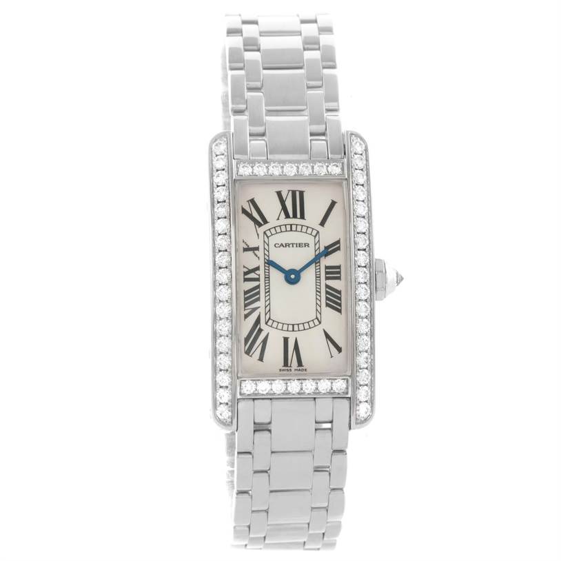 The image shows a Cartier Tank Américaine watch from a front angle, displaying the face, strap, and bezel.