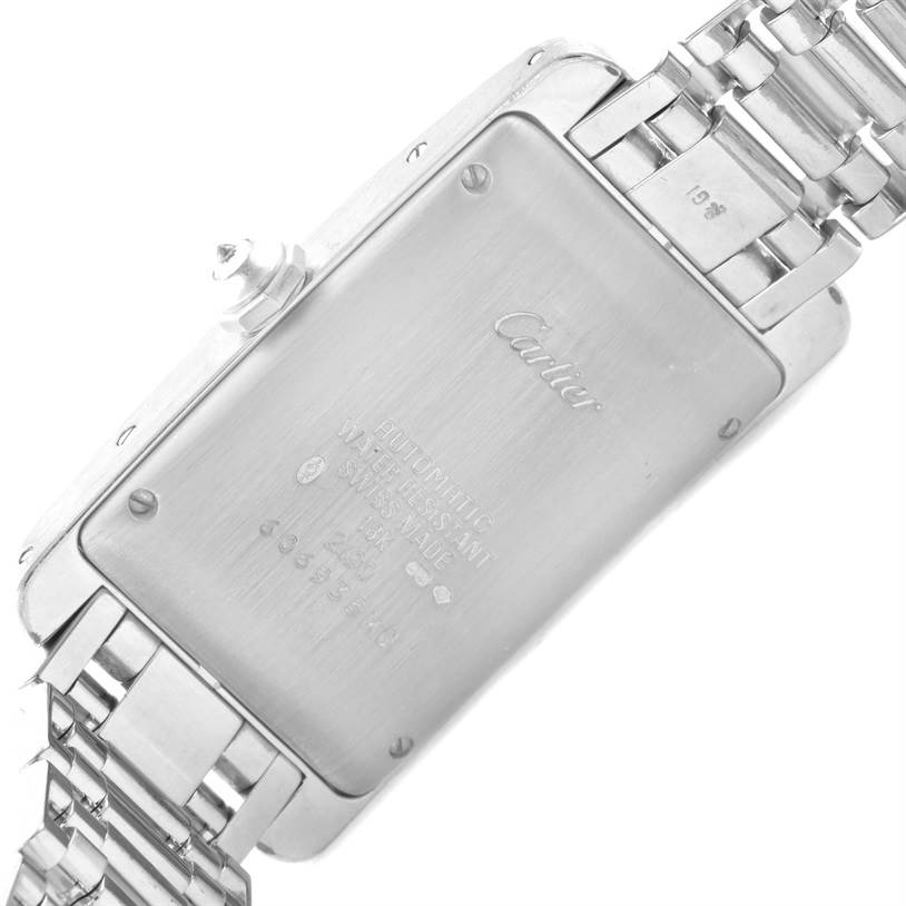 The image shows the back case and bracelet of a Cartier Tank Americaine 2423 Women's White Gold Silver Dial 2423 Women's White Gold Silver Dial watch.