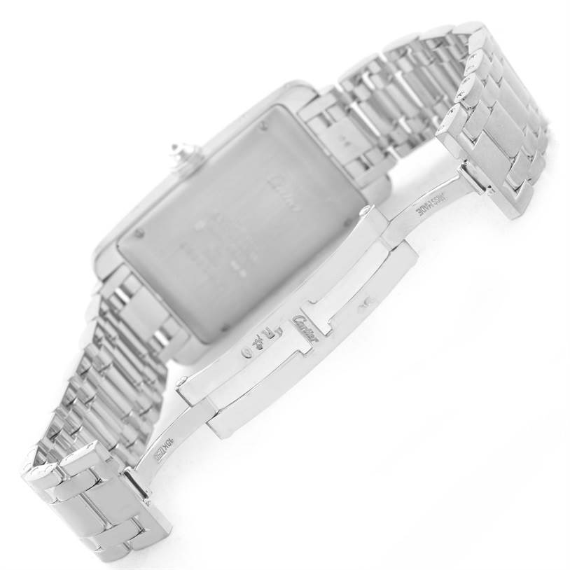 The image shows the back and bracelet clasp of the Cartier Tank Americaine 2423 Women's White Gold Silver Dial 2423 Women's White Gold Silver Dial watch.