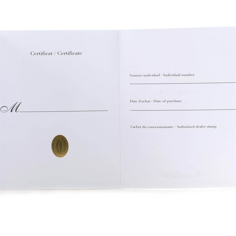 This image shows the open warranty certificate for the Cartier Tank Americaine W2607456 Women's Rose Gold Silver Dial W2607456 Women's Rose Gold Silver Dial model watch.