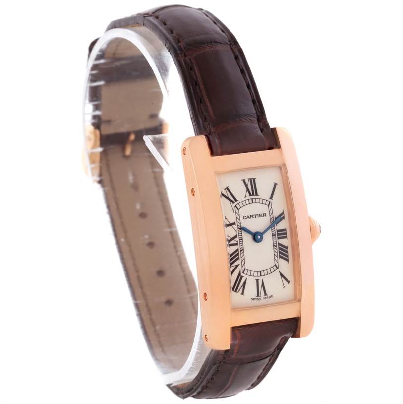 The image shows a Cartier Tank Americaine W2607456 Women's Rose Gold Silver Dial W2607456 Women's Rose Gold Silver Dial watch at a slight angled side view, displaying the face, leather strap, and sides of the case.