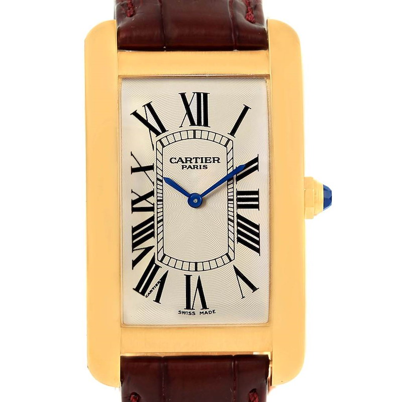 This image shows a frontal view of the Cartier Tank Americaine watch, highlighting its rectangular face, Roman numerals, and leather strap.