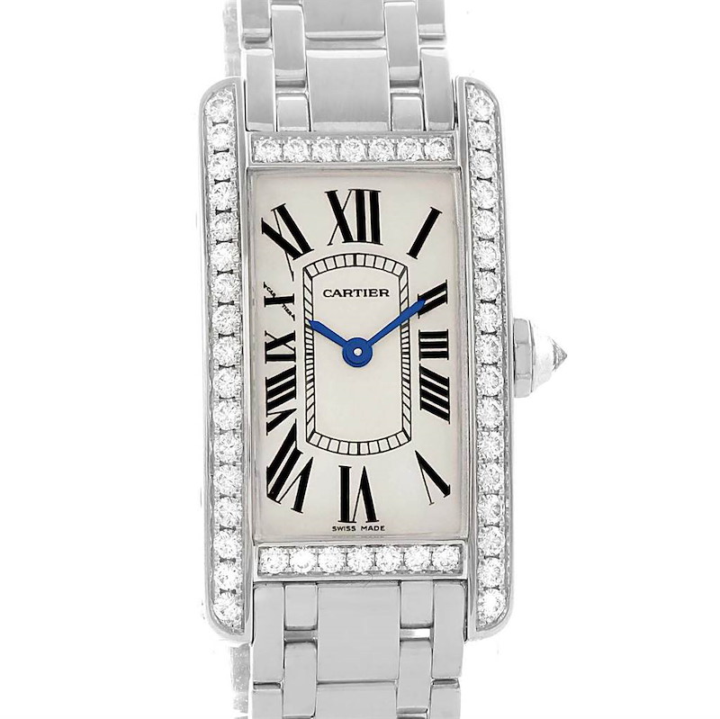 The image shows a front view of the Cartier Tank Americaine watch, highlighting its face, bezel with diamonds, and part of its bracelet.