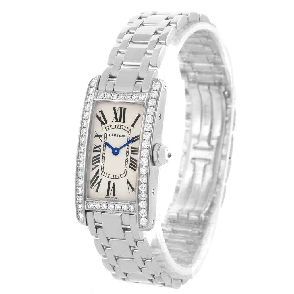 The image shows a Cartier Tank Americaine WB7073L1 Women's White Gold Silver Dial WB7073L1 Women's White Gold Silver Dial watch, angled to display its face, dial, crown, and metal bracelet.