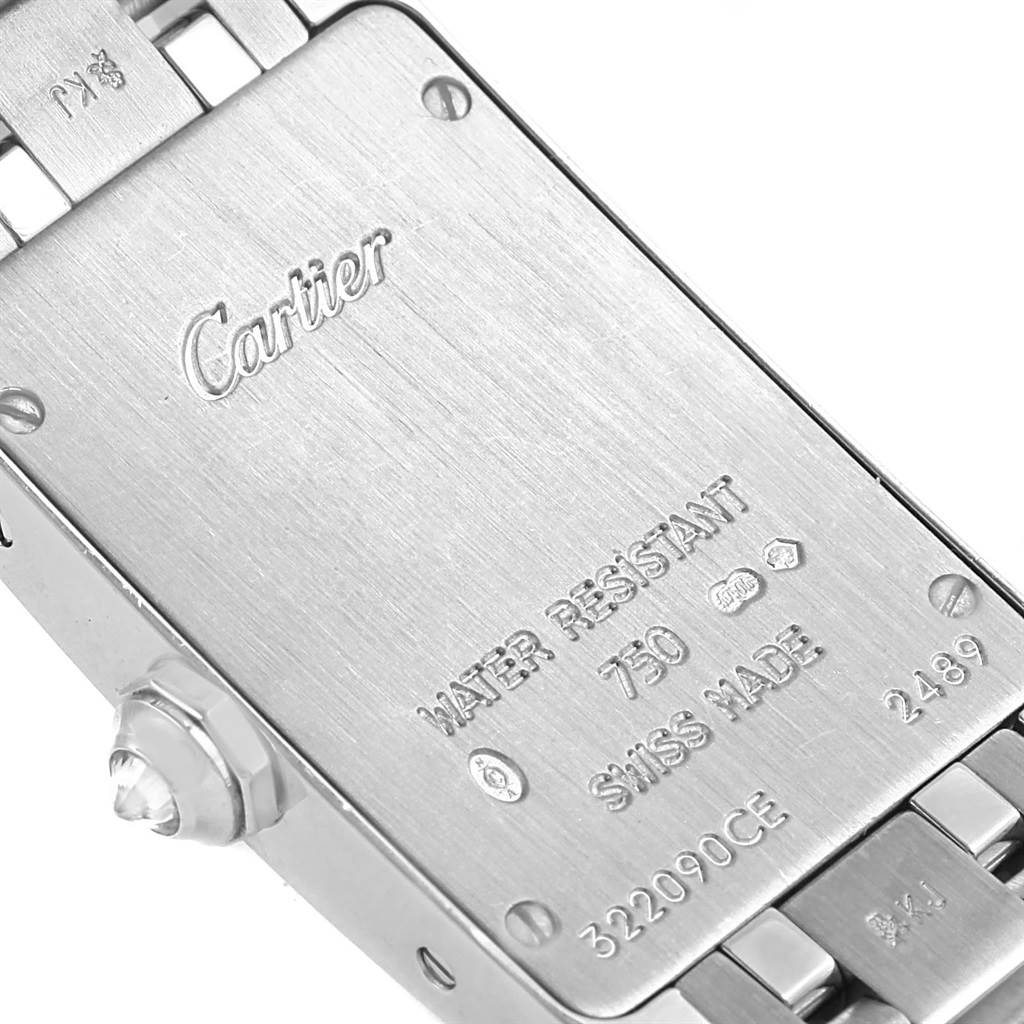 The image shows the back case and a portion of the bracelet of the Cartier Tank Americaine WB7073L1 Women's White Gold Silver Dial WB7073L1 Women's White Gold Silver Dial watch.