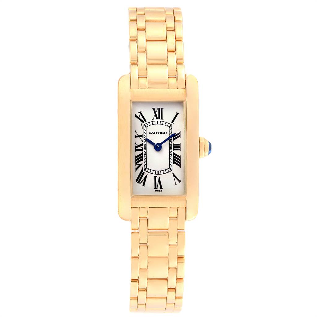 The image shows a frontal view of a Cartier Tank Americaine W26015K2 Women's Yellow Gold Silver Dial W26015K2 Women's Yellow Gold Silver Dial watch, highlighting its rectangular face, Roman numerals, and gold bracelet.